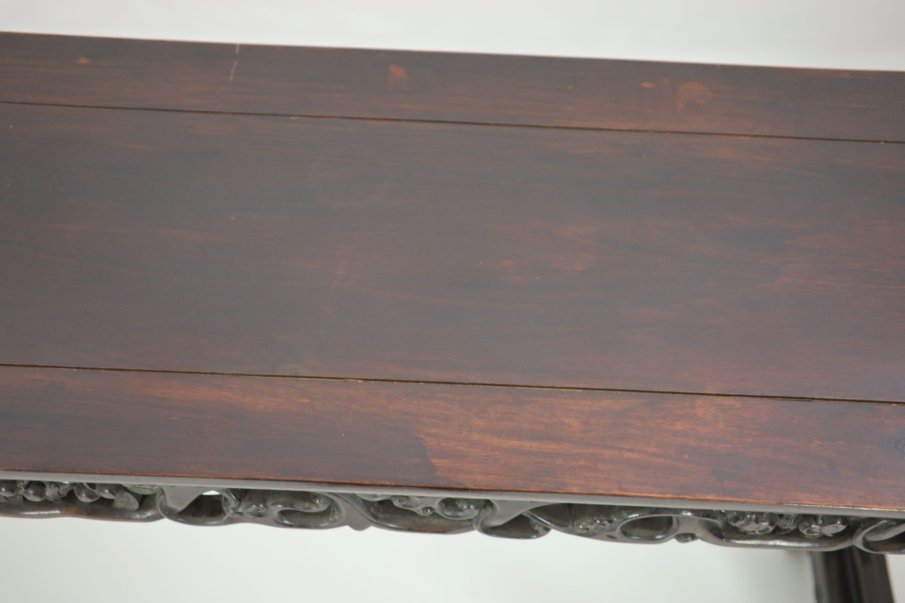 A large Chinese hongmu altar table, 19th century H 110cm. W 281cm. D 51.5cm.